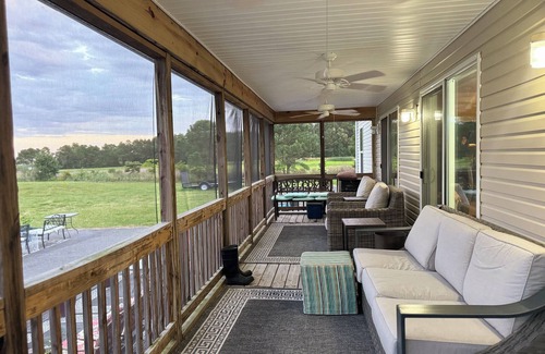 Cambridge House | Fish, kayak, bike, and more at this private serene 24-acre waterfront estate.