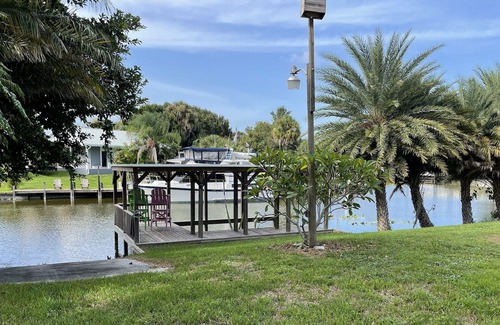 Taylor Creek House | Fisherman's paradise! Private corner canal lot with boat ramp and dock