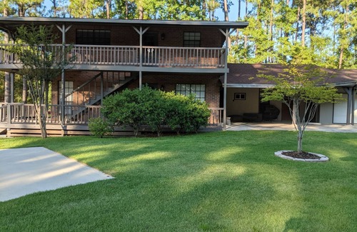 Brookeland House | Fishers Foxhole - two story home with wrap around deck and lake access.