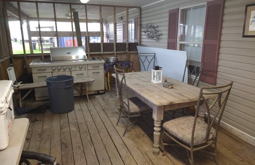 Boothville House | Fishing Camp sleeps 12, fully equipped. Screened in porch. 5 minutes from marina