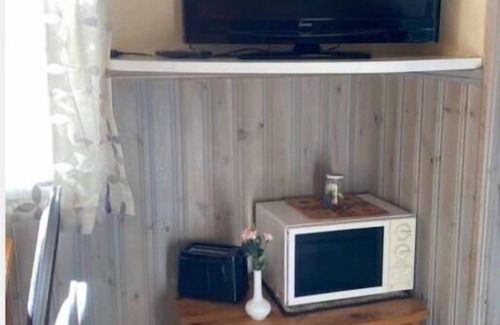 Ramsjo House | Fiska och bo på Ramsjö camping i stor timmerstuga