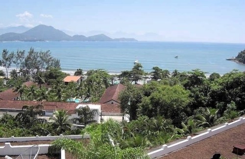 Toninhas Apartment | Fit. in complete condominium with panoramic view facing the Sea.