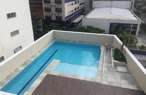 Pitangueiras Apartment | Fit with Gourmet Balcony, 150m from the beach, 3 bedrooms with air, pool and barbecue