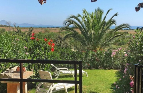 Sant'Elmo Apartment | Flat in Castiadas Costa Rei with garden, balcony or terrace