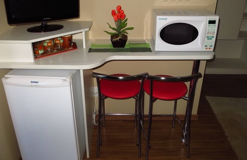 Serra Negra Apartment | Flat in green area with hotel service - 1 suite