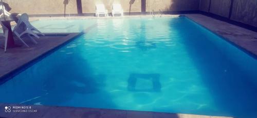 Pilar House | Flats quase beira mar ar piscinas até 8 pessoas caseiro