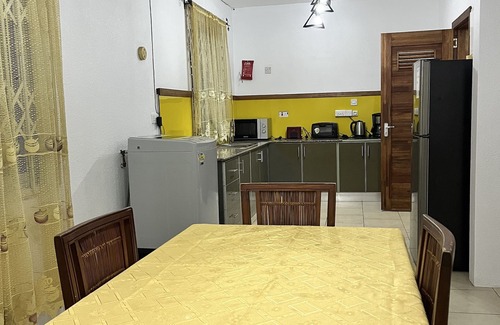 Wolmar Apartment | Flic En Flac: Furnished 2 bedrooms 60m from beach with WIFI & Nespresso cafe