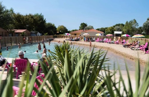 Chateau-d'Olonne Cabin | Flower Camping Le Petit Paris * - Premium Spa Cabin 33m² (2 bedrooms) + covered terrace + TV + LV + Plancha + Sheets + Towels 4 to 5 people - 4 people inc.