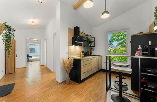 Miesbach Apartment | Flussperle Miesbach - Erholung pur direkt an der Schlierach - Dachterrasse mit Grill, kostenloses Parken