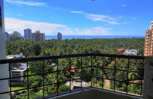Kannur Apartment | Forget your worries in this spacious and serene space. Wind down RECHARGE !n