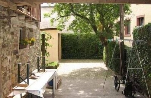 Waxweiler House | Former farm with a rebuilt barn and courtyard
