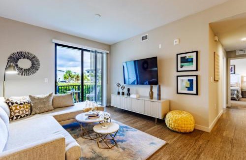 Three Oaks Apartment | Fort Myers 2BR Condo Pool BBQ Area