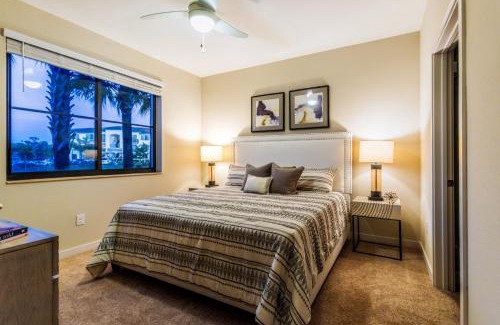 Three Oaks Apartment | Fort Myers 2BR Condo Pool BBQ Area