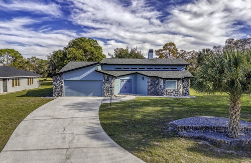 Spring Hill House | Four Beds, three baths, heated pool, and a Golf Course. What more do you need!