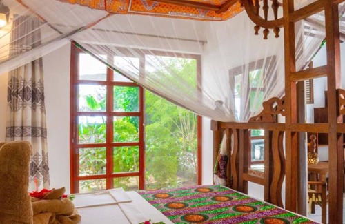 Jambiani Apartment | Frangipani Suite - Deluxe Triple Seaview with AC