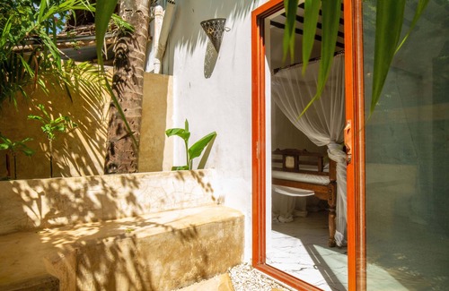Jambiani Apartment | Frangipani Suite - Deluxe Triple Seaview with AC