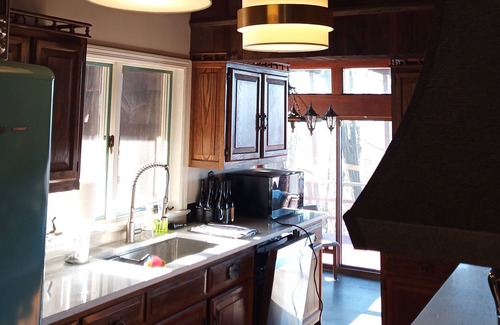 Connellsville House | Frank Lloyd Wright inspired property with sweeping views