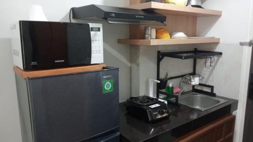 Java Apartment | FREE WIFI, NETFLIX, SMART TV, MINERAL WATER, AMENITIES - Studio with Foldable Wall Bed at Serpong Garden Apt