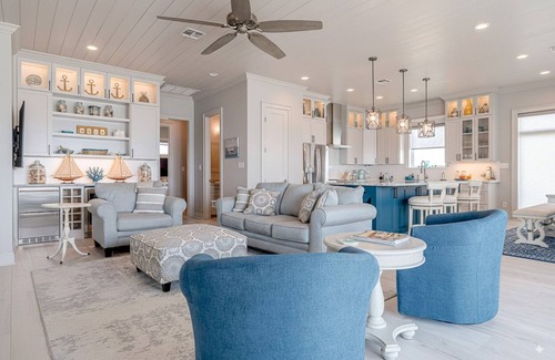 Spanish Grant House | From the moment you arrive, the Gulf stretches out before you in an endless sweep of blue and gold — a living canvas of rolling waves, soft breezes, and skies that shift with every hour. Here, the ocean isn’t just a view; it’s a rhythm that slows you
