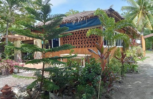 Carles Resort | Front Beach Cottages Rental Breakfast included