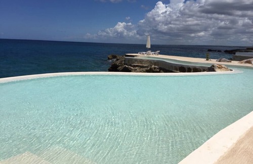 Dominicus Apartment | FRONT CARIBBEAN OCEAN , APARTMENT WITH GARDEN & POOLS & OCEAN ENTRYS