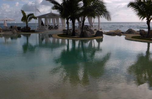 Dominicus Apartment | Front of Caribbean Sea, beautiful apart. with pools & direct access to sea.
