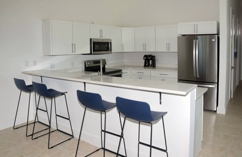 Treasure Cay Resort | FRONTLINE Condo with SENSATIONAL bidirectional views of Treasure Cay Beach!