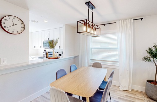 Bay Acres House | Full duplex near beach with renovated interior, screened porches-Dogs ok
