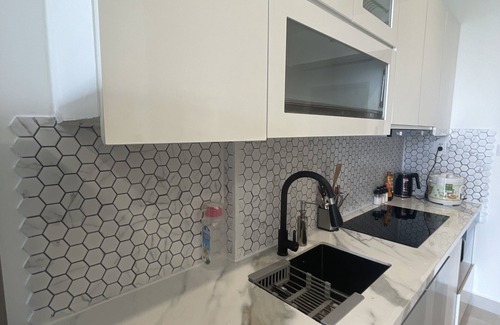 District 9 Apartment | Full services apartment with pool view