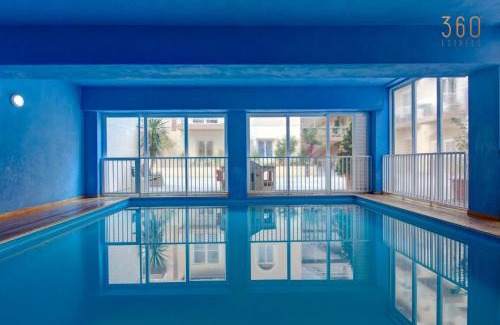 Qawra Apartment | Fully equipped 2BR home with Pool & Gym access by 360 Estates