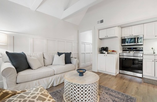 West Beach Village Villa | Fully renovated, beach across the street!