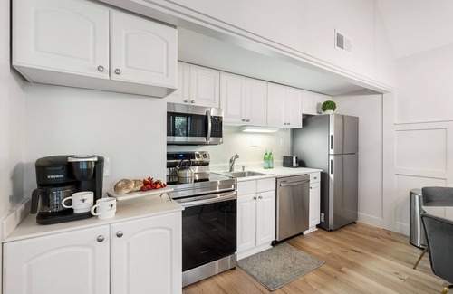 West Beach Village Villa | Fully renovated, beach across the street!