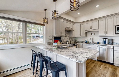 Harrison House | Fully renovated home with lake view, dock & mooring access, kayaks, & deck