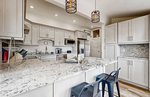 Harrison House | Fully renovated home with lake view, dock & mooring access, kayaks, & deck