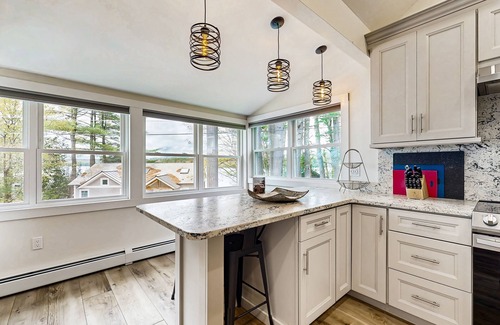 Harrison House | Fully renovated home with lake view, dock & mooring access, kayaks, & deck