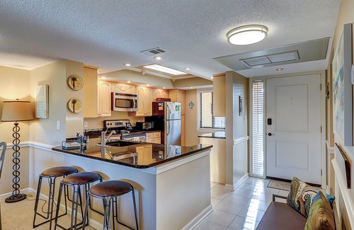 Folly Field Villa | Fun island retreat with pool, hot tub, beach access & balcony