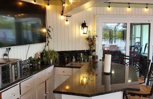 Fort Myers Shores House | Fun Relaxing Riverfront Destination Home With Activities
