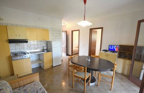 Lignano Pineta Apartment | Functional flat with balcony for 7 guests in Lignano Sabbiadoro