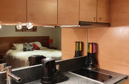 Santiago Apartment | Furnished apartment with equipped terrace and air conditioning.