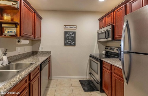 Biloxi Condo | Furnished beachfront condo near Keesler. Wifi included. Cypress Cove 213