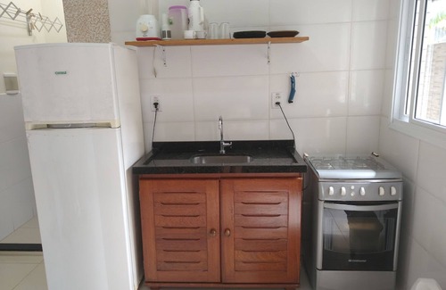 Ipiranga Apartment | Furnished kitchenette with swimming pool and leisure area nearby. the beach Martim de Sá