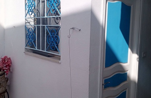 El Halfaouine Apartment | Furnished room with veranda
