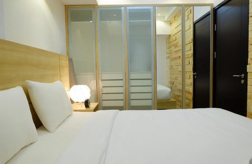 Pagedangan Apartment | Futuristic 1BR Casa De Parco Apartment near ICE BSD By Travelio