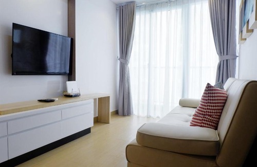 Pagedangan Apartment | Futuristic 1BR Casa De Parco Apartment near ICE BSD By Travelio