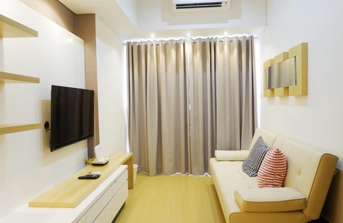 Pagedangan Apartment | Futuristic 1BR Casa De Parco Apartment near ICE BSD By Travelio