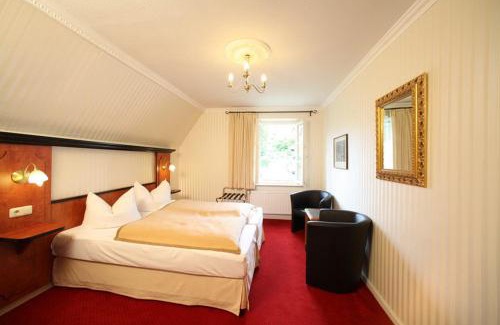 Schloßlein Hotel | Gästehaus Plönlein - Hotel Goldener Hirsch Rothenburg