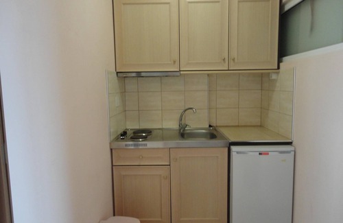 Benitses Apartment | Galini Sea Apartment 3 at the Beach with Wi-Fi, A/C & Garden