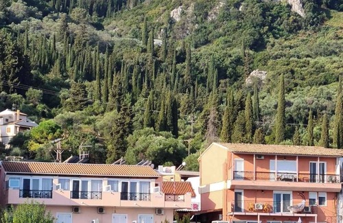 Benitses Apartment | Galini Sea Apartment 3 at the Beach with Wi-Fi, A/C & Garden