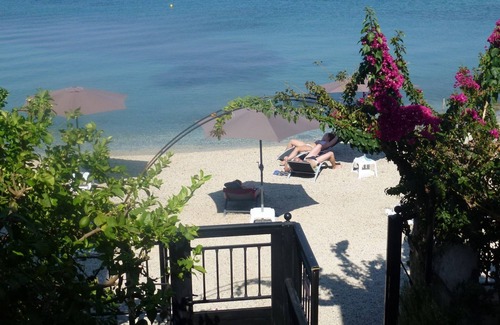 Benitses Apartment | Galini Sea Apartment 3 at the Beach with Wi-Fi, A/C & Garden