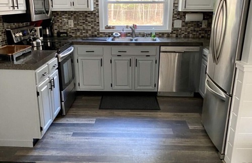 North Conway House | Game Room, 2 family rooms, on 3 levels, with a fenced yard and firewood provided